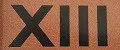 XIII