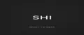 SHI.